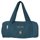 sac de sport en coton de couleur bleu pétrole, marquage or pailleté avec prénom et motif au choix